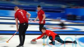 Today at the Winter Olympics: Medal hopes lie on shoulders of men’s curling team