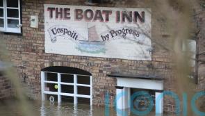 Wind and snow warnings issued as flooding risks remain