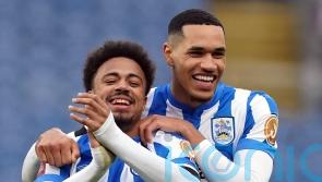 Huddersfield hit late double to beat Cardiff and boost promotion hopes