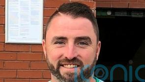 Woman charged with murder over Belfast stabbing