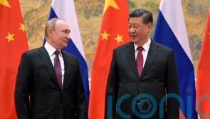 China denies asking Russia not to invade until post-Olympics
