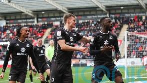 Ten-man MK Dons come from behind to beat leaders Rotherham