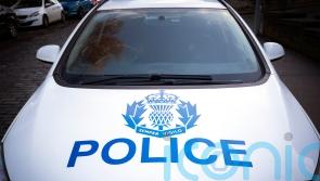 Man, 75, dies after car overturns near shopping centre