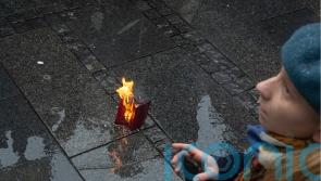 Russian man burns passport to show anger over invasion of Ukraine