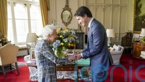 Queen welcomes Canadian PM at first in-person audience since catching Covid