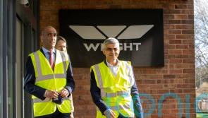 Khan calls for funding certainty for TfL during visit to Co Antrim bus plant