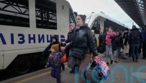 Ukrainians flee embattled cities as refugee numbers pass two million