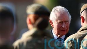 Charles presents medals to troops on Operation Shader