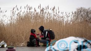 Ukrainians flee besieged cities as conditions worsen