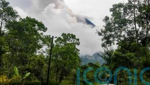 Hundreds flee as Indonesian volcano erupts