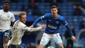 Kilmarnock move top of Championship after easing to victory at 10-man Ayr