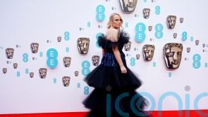Bafta host Rebel Wilson opens film ceremony with weight loss gags