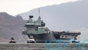 Aircraft carrier HMS Queen Elizabeth returns to Firth of Clyde