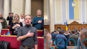 Ukrainian MPs sing national anthem at emergency parliamentary session in Kyiv