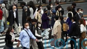 Japan to fully lift coronavirus restrictions as infections slow