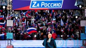 Vladimir Putin praises Russian troops as assault on Ukraine’s cities continues