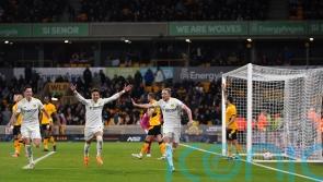 Luke Ayling hits last-minute winner as Leeds battle back to win at Wolves