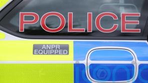 Taxi driver puts out fire after shop targeted by arsonist