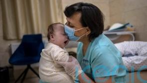 Surrogate babies wait out war in makeshift bomb shelter
