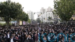 Hundreds of thousands of mourners attend mass funeral of leading rabbi