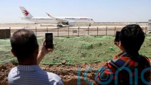 Plane carrying 132 people crashes in southern China