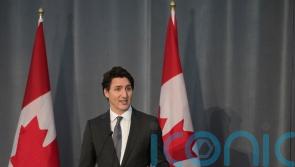 Trudeau strikes deal to keep his party in power until 2025