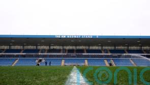 Football ban for fan who pushed player who ran into stand