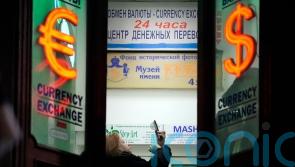 Russian stock market faces heavy restrictions as limited trading resumes