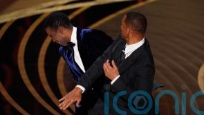 Will Smith appears to hit Chris Rock on Oscars stage after gag about wife Jada