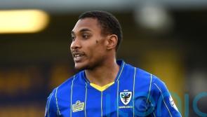AFC Wimbledon put Darius Charles in caretaker charge after Mark Robinson exit