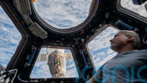 US astronaut returns in Russian capsule to end record space mission