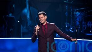 Michael Buble fends off Machine Gun Kelly to deliver chart success