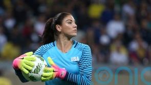 US football star Hope Solo arrested after being found passed out in car