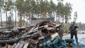 Ukrainian forces retake areas near Kyiv amid fear of traps