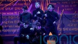 BTS deliver flirtation and a fall during Grammys performance