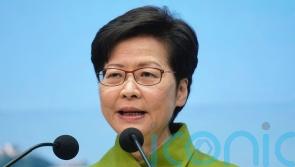 Carrie Lam to quit as Hong Kong leader without seeking second term