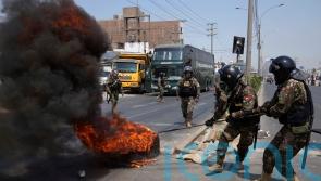 Peru imposes curfew to quell protests over rising prices