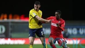 Zach Robinson rescues AFC Wimbledon a point against 10-man Charlton