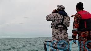 Missing divers in Malaysia surfaced before drifting apart, survivor says