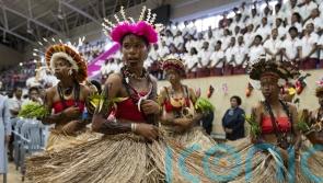Anne greeted by traditional performances at Papua New Guinea school