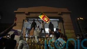 Sri Lanka halts debt repayment pending IMF bailout plan