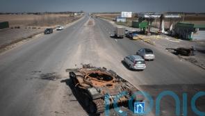 Police: More than 900 civilian bodies found in Kyiv region