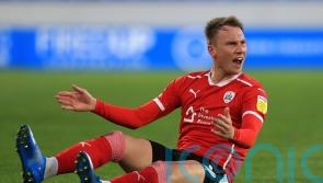 Cauley Woodrow could return to starting line-up as Barnsley face Peterborough