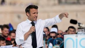 Macron courts Marseille voters as climate activists stage Paris demo