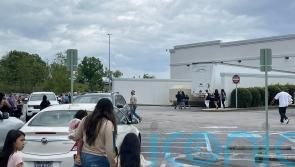 Three held after 12 injured in shooting at South Carolina mall
