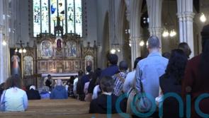 How has Christianity provided a sense of community for Afghan refugees?