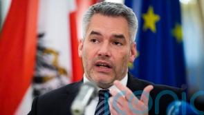 Austrian leader says after visit that Vladimir Putin believes he is winning war