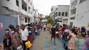 Sri Lanka’s president appoints 17 new ministers after weeks of protests