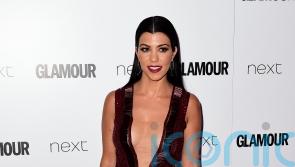 Kardashian family and Travis Barker share sweet tributes as Kourtney turns 43