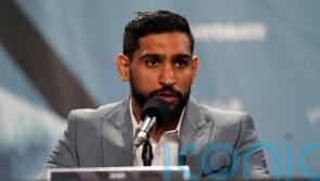 Former world champion Amir Khan says he has been robbed at gunpoint